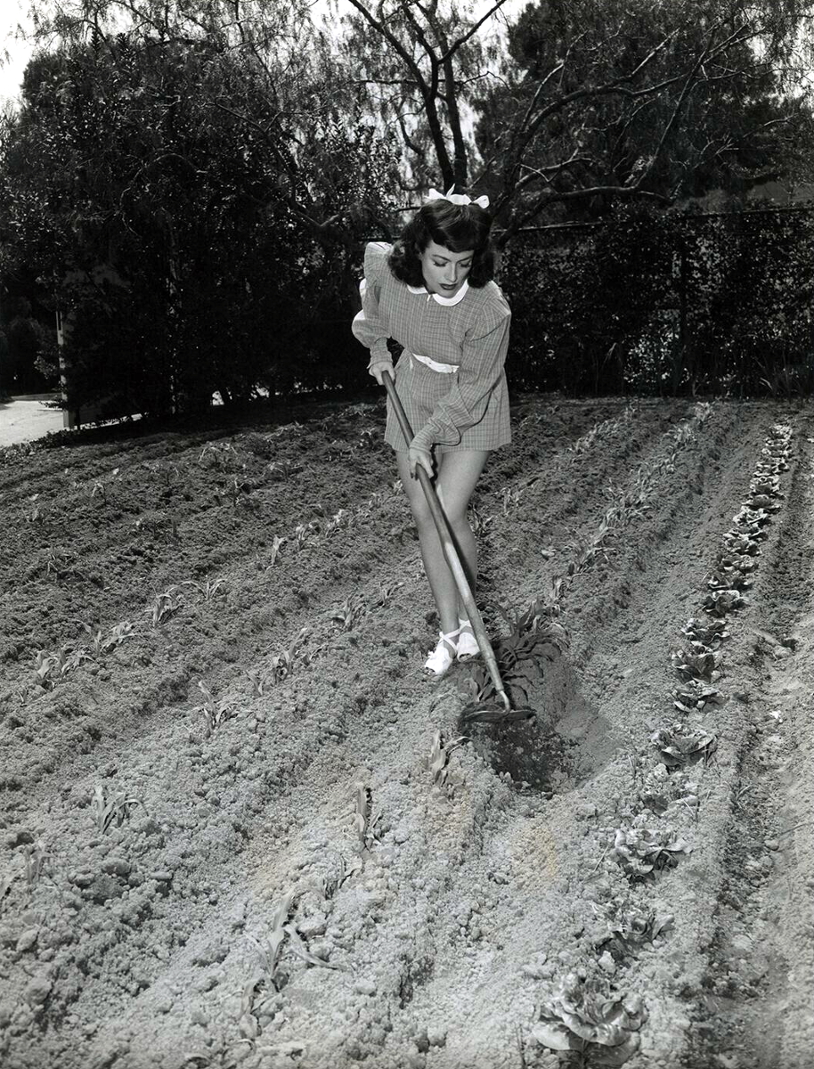 1944. At home in Victory garden.