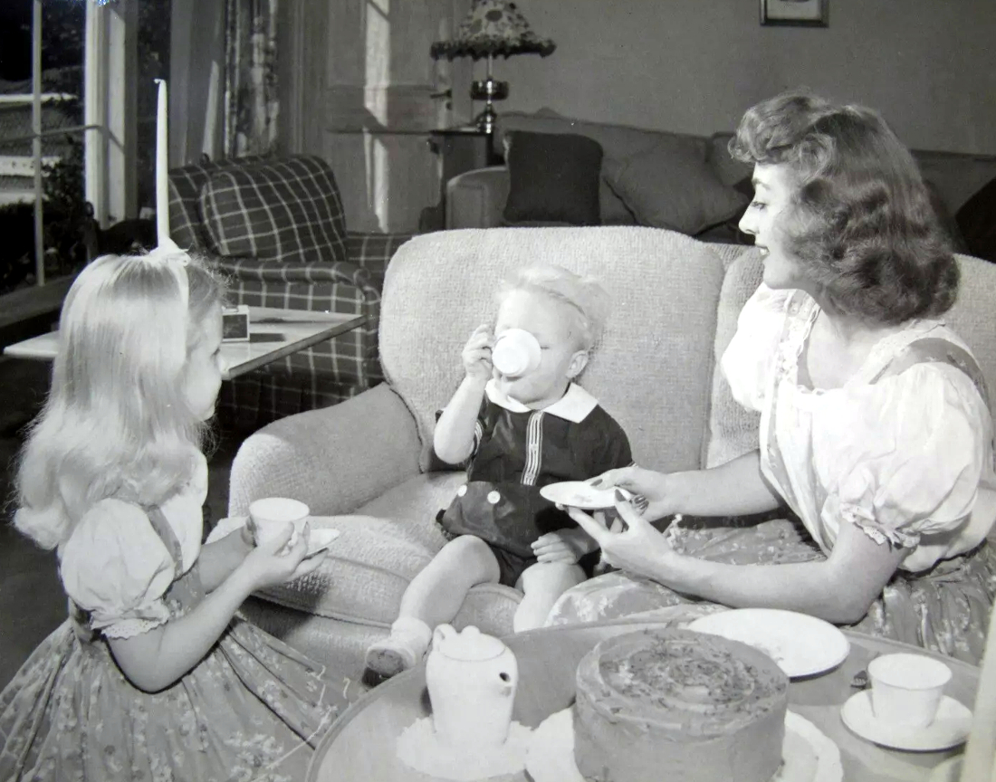 Circa 1945 at home with Christina and Christopher.