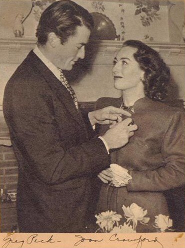 December 1945, with Gregory Peck. Both were receiving the Golden Apple Award.