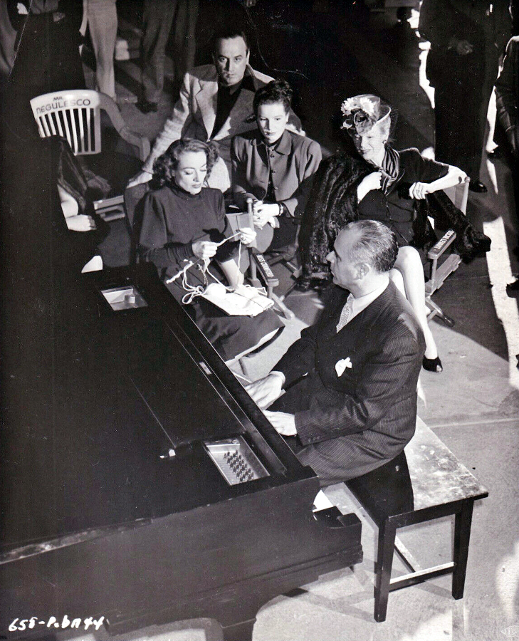 1946. On the set of 'Humoresque' with pianist Jose Iturbi.