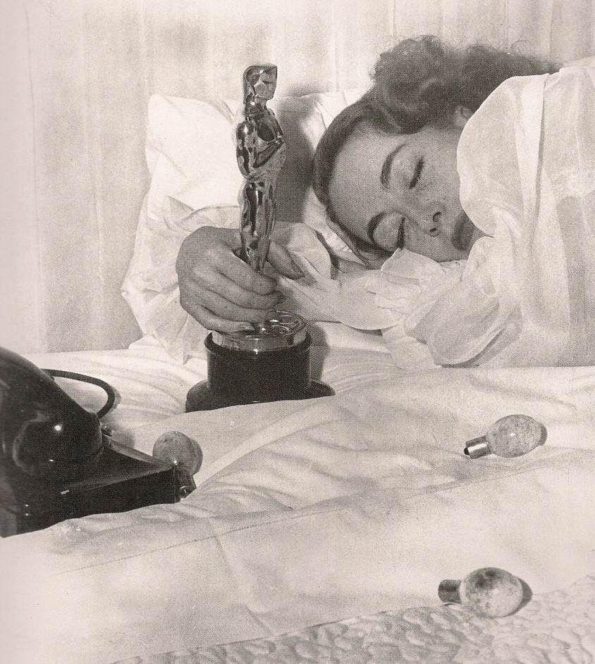 3/7/46. At home with her new Oscar.