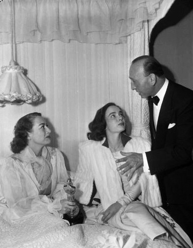 3/7/46. At home on Oscar night with Ann Blyth and Mike Curtiz.