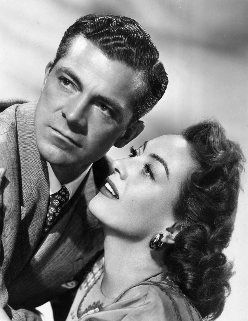1947. 'Daisy Kenyon' publicity with Dana Andrews.