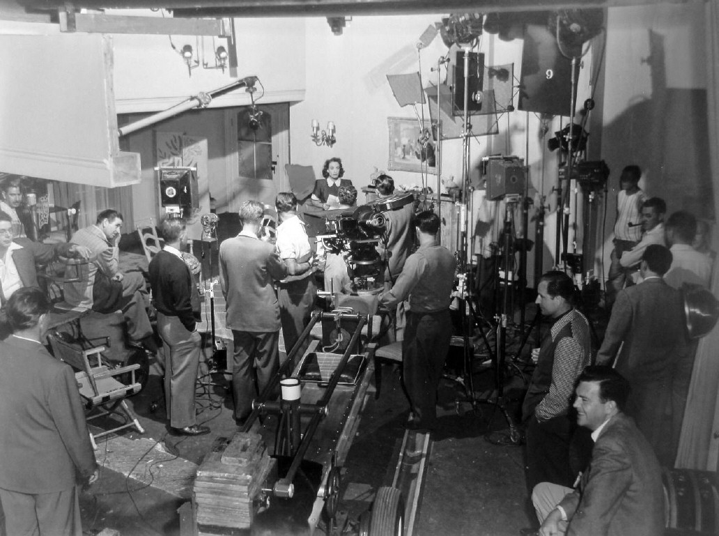 1947. On the set of 'Daisy Kenyon.' Long shot of photo above.