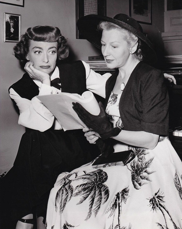 August 1948, with Gertrude Michael.