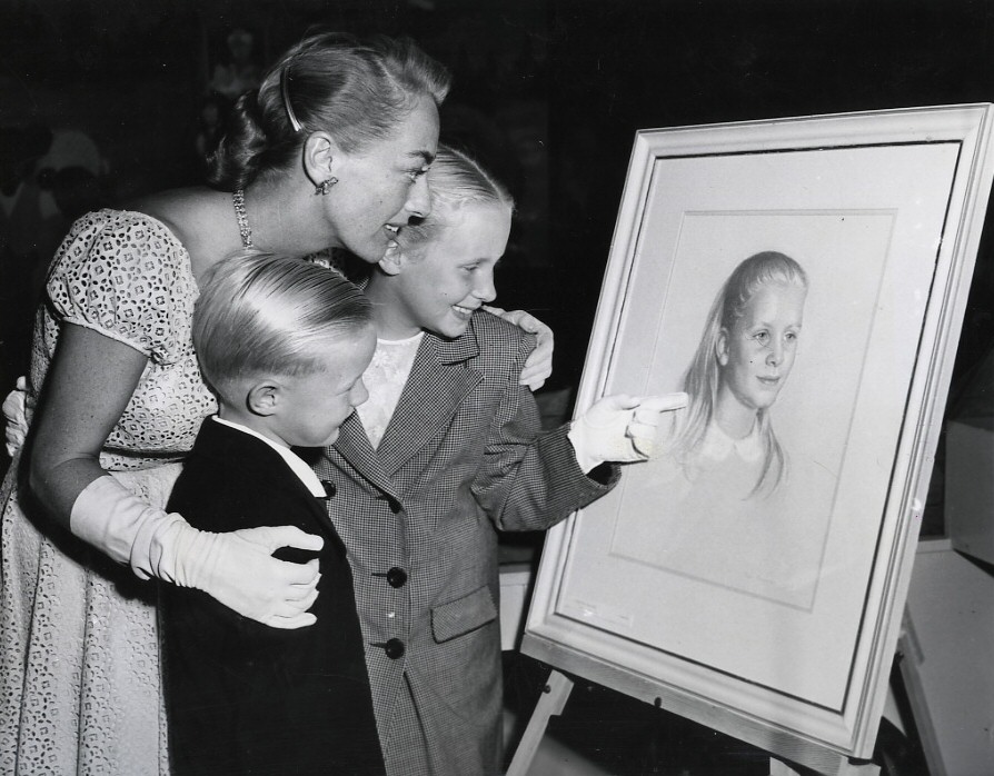 1948. Gazing at a portrait of Christina.