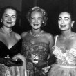 1953. With Olivia de Havilland, left, and unknown.