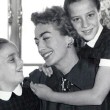 1956 publicity candid with twins Cathy and Cindy. Includes press caption.