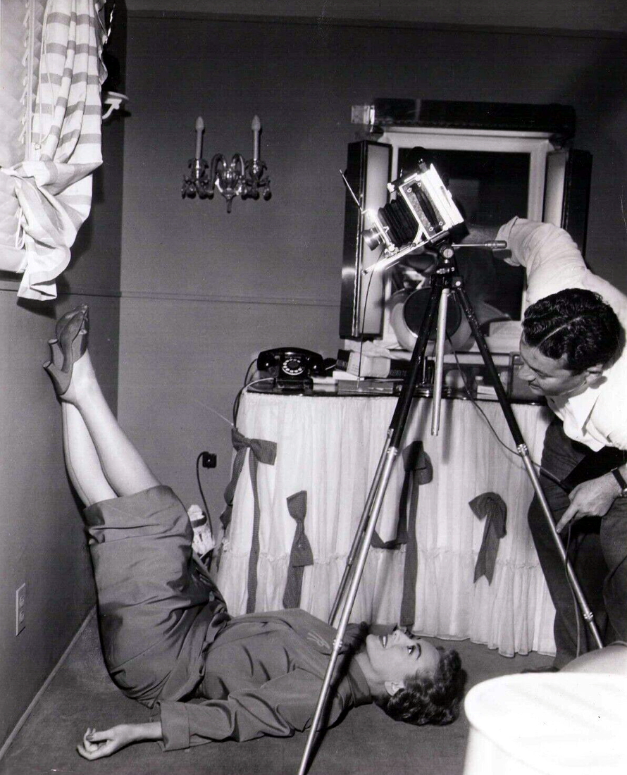 1951. On the set of 'Goodbye, My Fancy' with photographer Jack Woods.