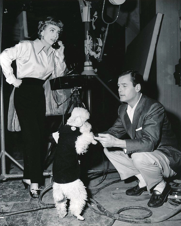 1953. On the set of 'Torch Song' with Gig Young and Cliquot.