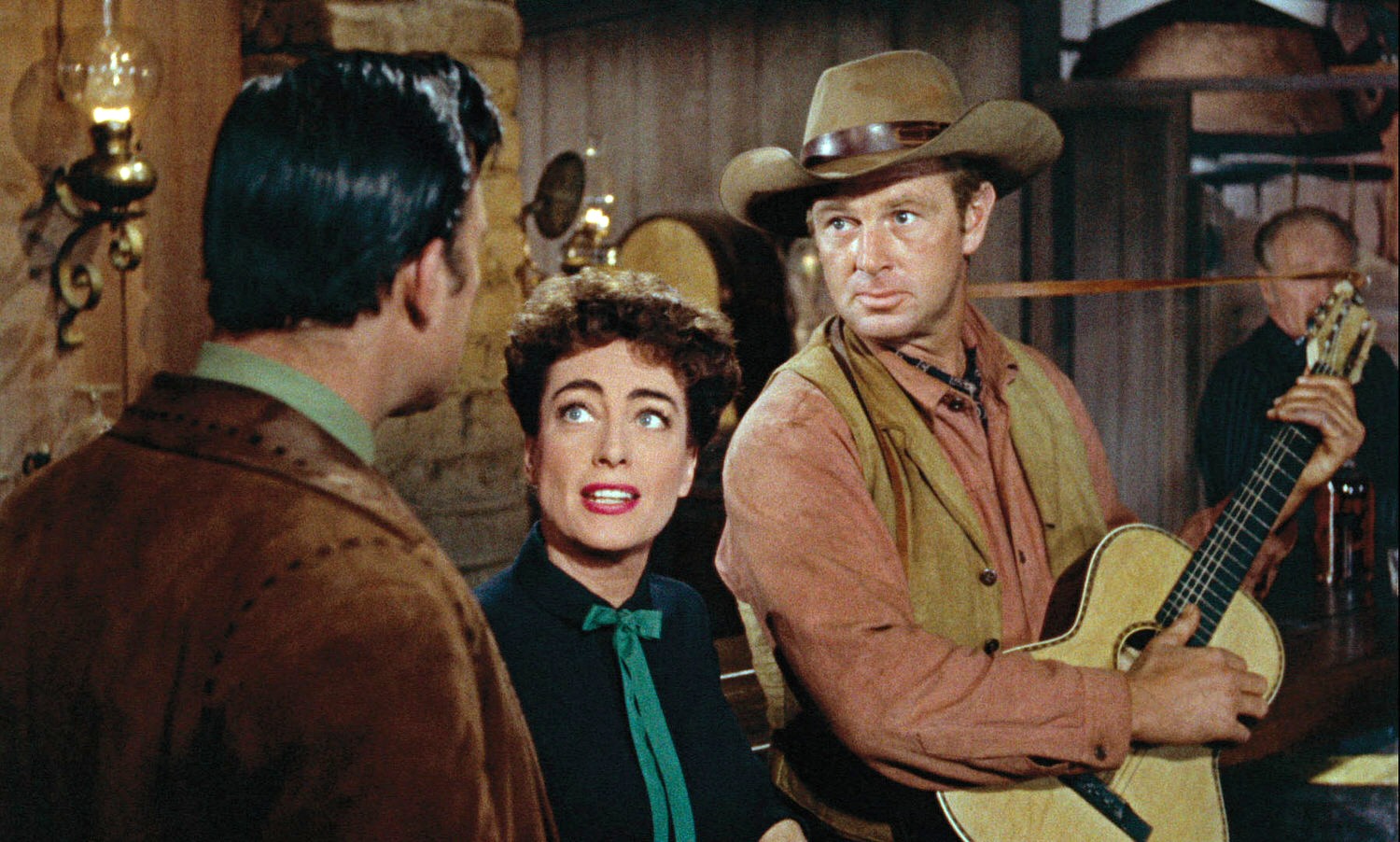 1954. 'Johnny Guitar' screen shot with Scott Brady, left, and Sterling Hayden.