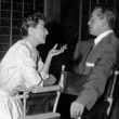 1955. On the set of 'Female on the Beach.' With director Joseph Pevney. 