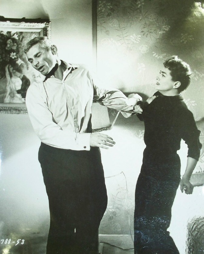 1955. 'Female on the Beach.' Jeff Chandler gets whacked. Again.