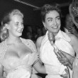 October 1955 at Los Angeles Ice Follies with Christina. Three candids.