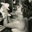 1955. On the QB set with bunny. Shot by Kornmann.