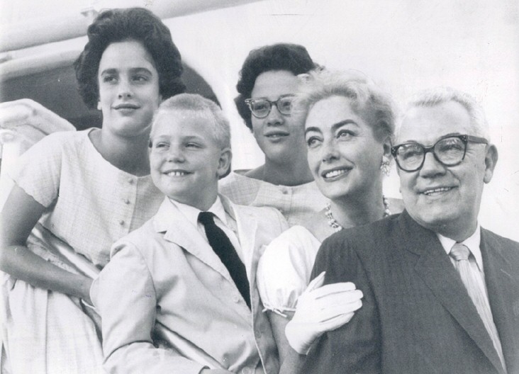 August 6, 1958. Back in America aboard the USS United States. With twins, Al, and Al's son Sonny.