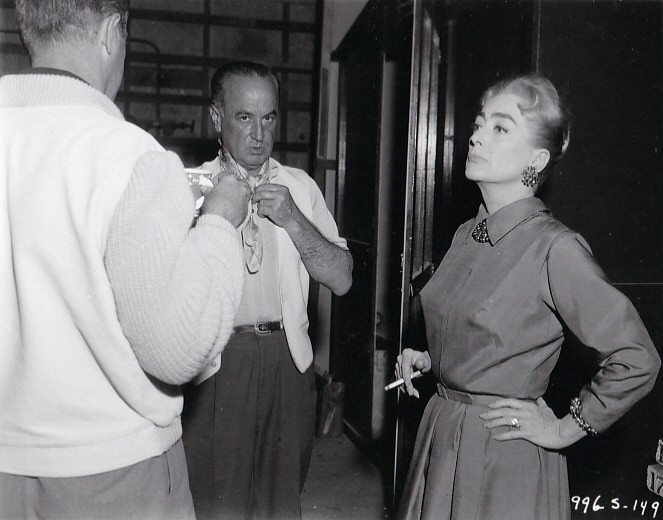 1959. On the set of 'The Best of Everything' with director Jean Negulesco.