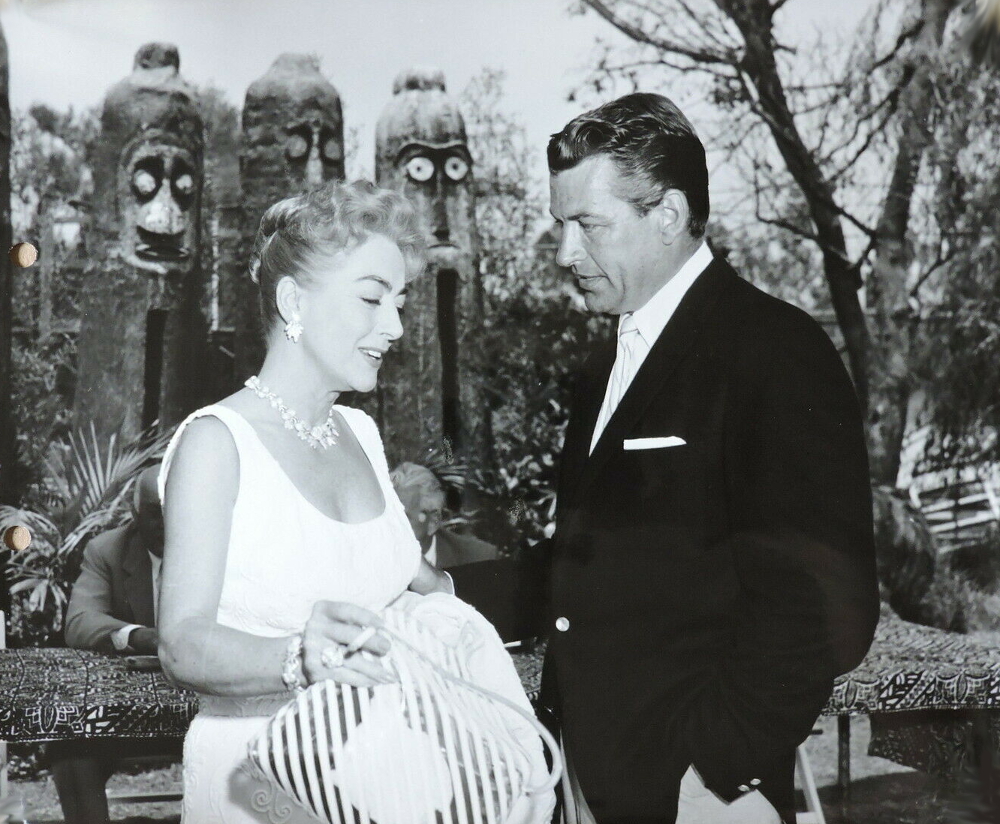 1959. At a 20th Century-Fox party with Richard Egan. Shot by Eve Arnold.