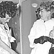 November 1960. (That might be radio host Shirley Eder with Joan.)
