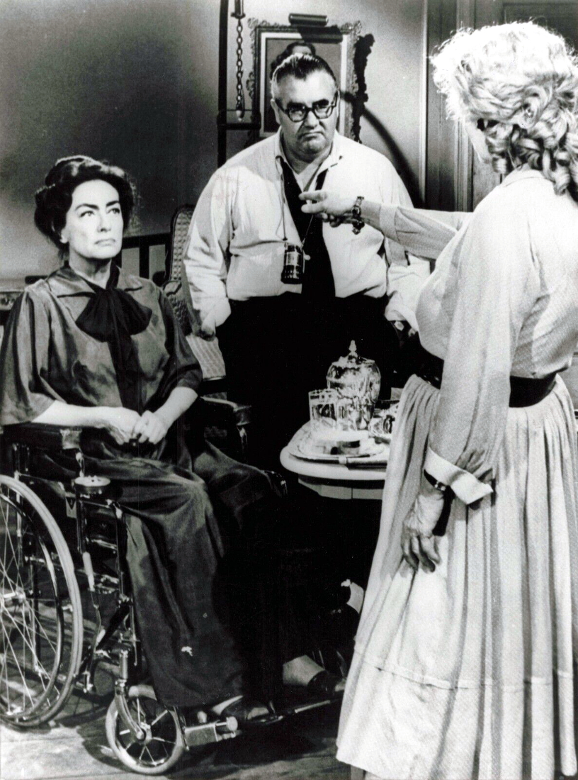 1962. On the 'Baby Jane' set with director Aldrich and Davis.