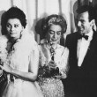 With Gregory Peck, Sophia Loren, and Maximilian Schell. (Thanks to Bryan.)