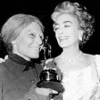 May 1963. Delivering Anne Bancroft's Oscar on the set of 'Mother Courage and Her Children.'