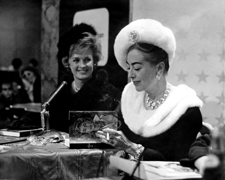 1962. 'Portrait of Joan' book signing.