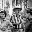 On the set of 'Strait-Jacket' with Diane Baker and director Castle. (Thanks to Henrique.)