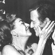 Joan receives the Cecil B. DeMille Award from John Wayne at the Golden Globes. 2/3/70.