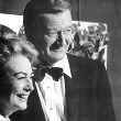 With John Wayne at the Golden Globes.