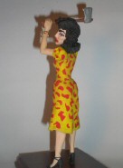 'Strait-Jacket.' Click to see 4 big Lucy-doll photos.