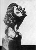 1941 sculpture of Joan by Yugoslavian artist Yucca Salamunich, inscribed 'To Christina.' Commissioned for 'A Woman's Face,' the sculpture made a reappearance in 1964's 'Strait-Jacket.' This page also includes 5 shots of the sculptor creating the work in 1941.